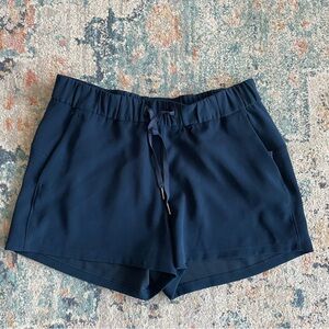 Lululemon Women's On the Fly Navy Blue Shorts size 10 2.5” inseam